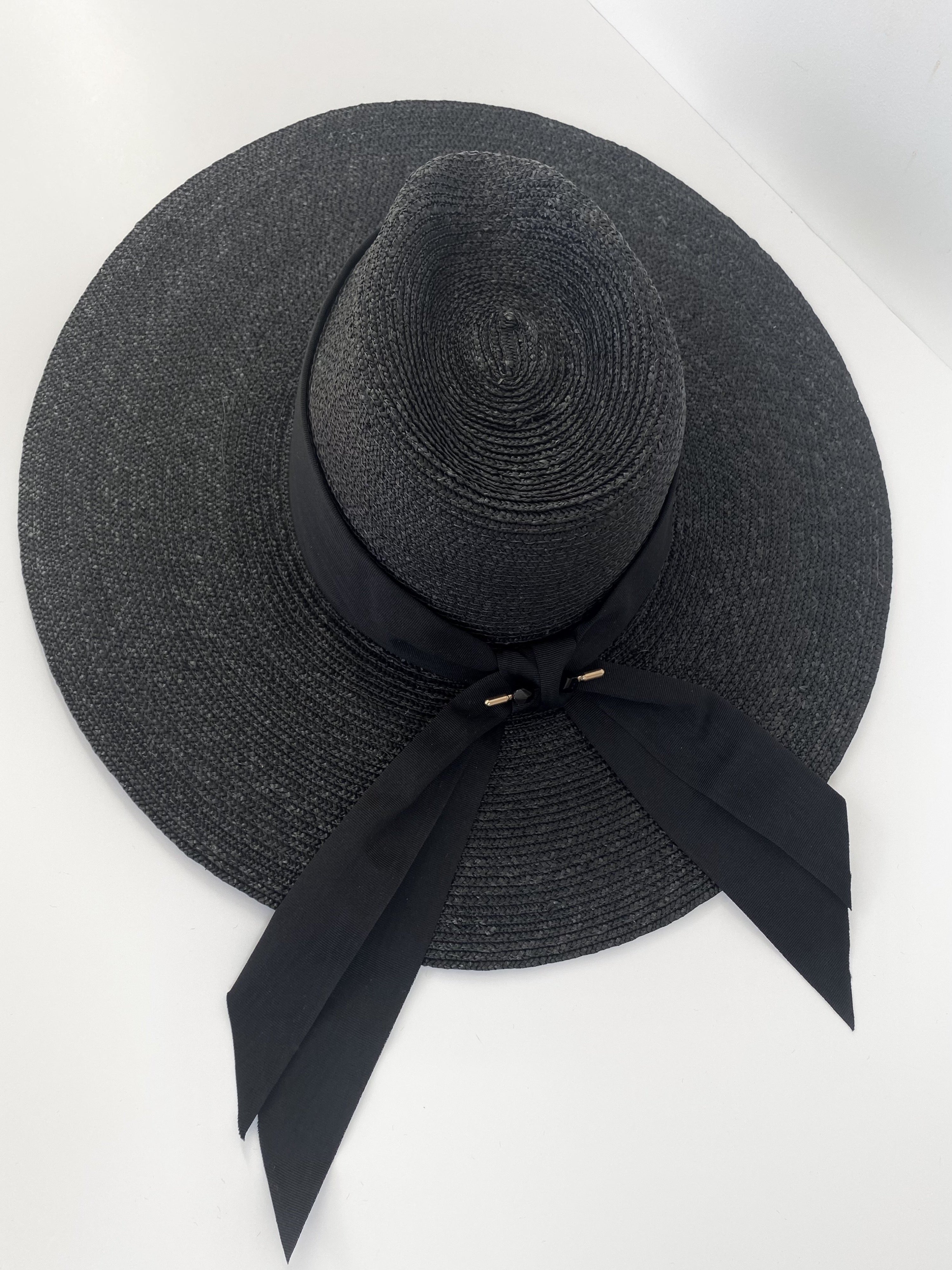 Black straw wide brimmed sun hat with bow at back - Moira – Georgina Blyth  Millinery